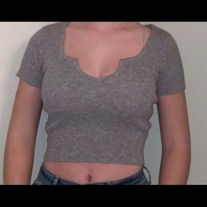 grey top with top cut